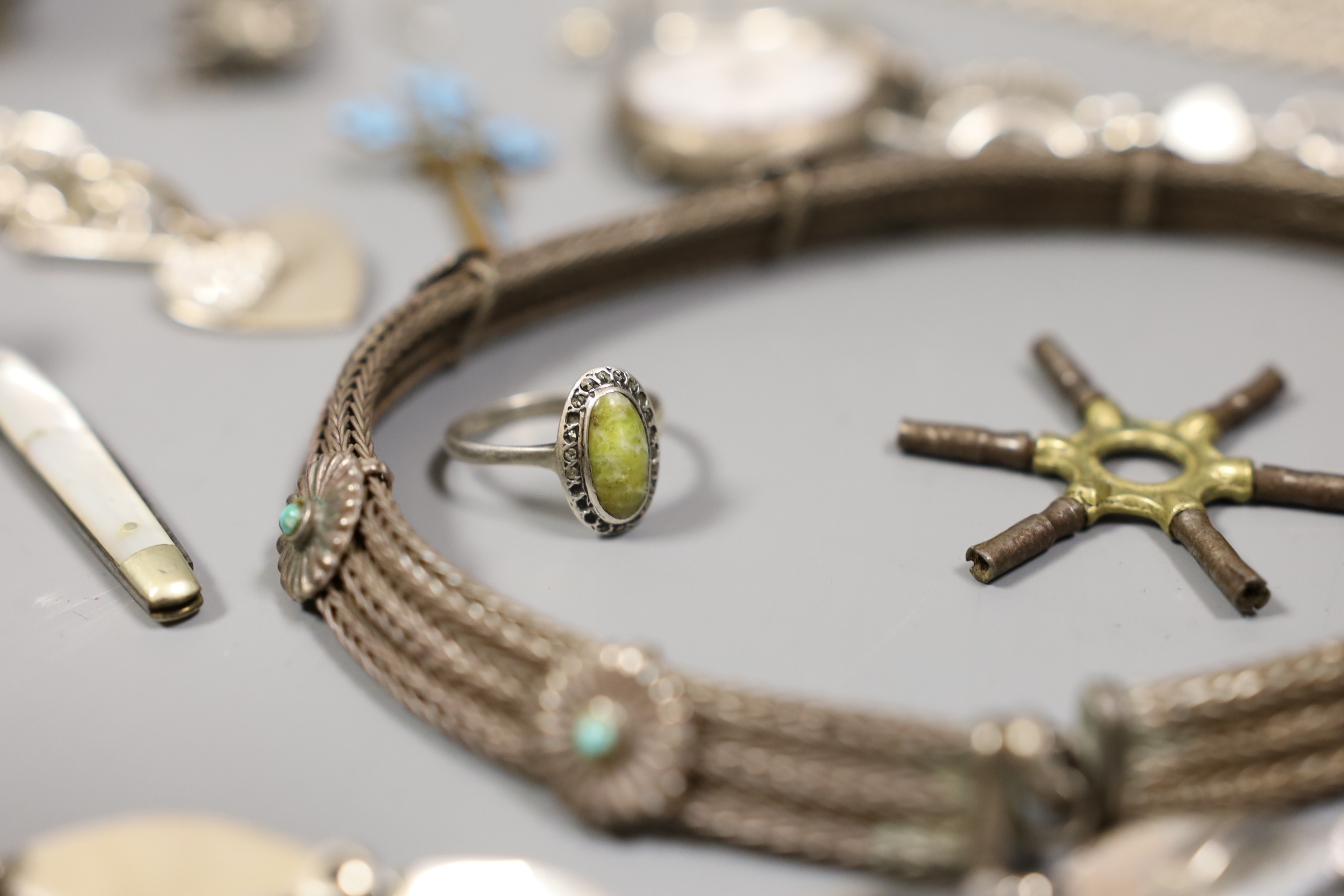 Assorted mainly silver and white metal jewellery, including vesta case, a Chinese white metal salt, a white metal propelling pencil modelled as a pig, two fob watches and a wrist watch, bracelet chains, a plated guitar b